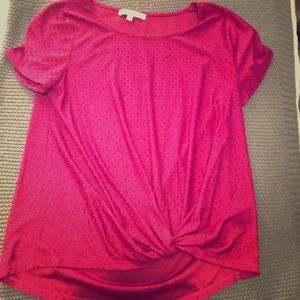 Pink spotted blouse with a tied bottom